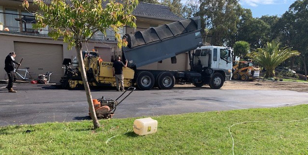 This is a photo of an asphalt driveway which is in the process of being installed by Clifton Asphalt & Bitumen Surfacing