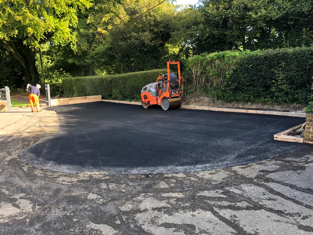 This is a photo of a bitumen driveway which is in the process of being installed by Clifton Asphalt & Bitumen Surfacing