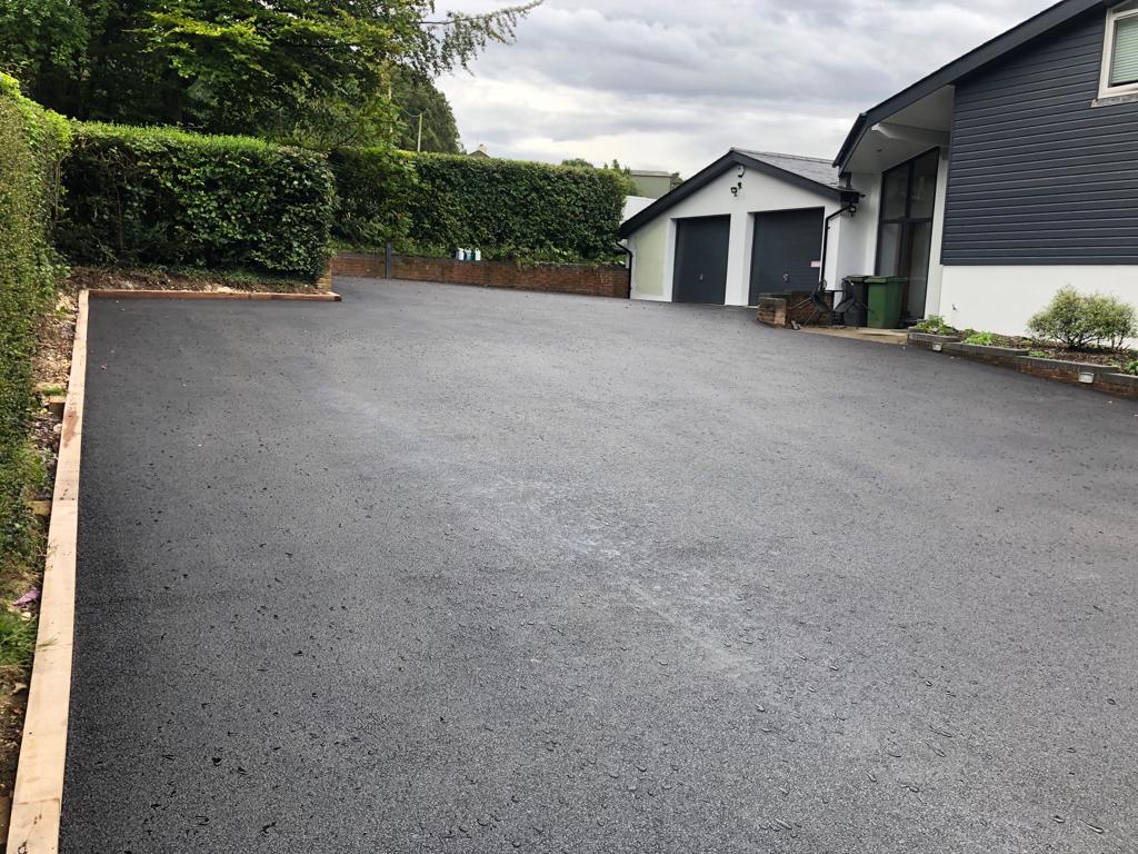 This is a photo of a asphalt driveway which is in the process of being installed by Clifton Asphalt & Bitumen Surfacing