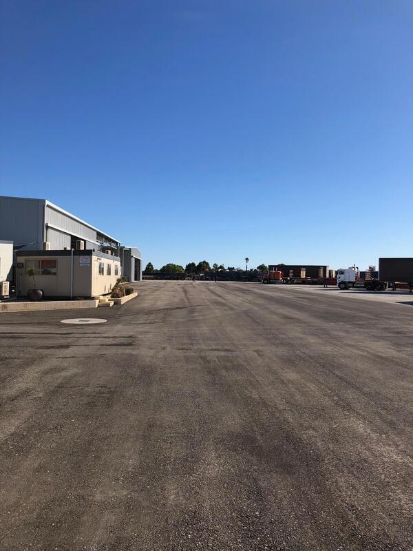 This is a photo of a hardstand driveway which is in the process of being installed by Clifton Asphalt & Bitumen Surfacing